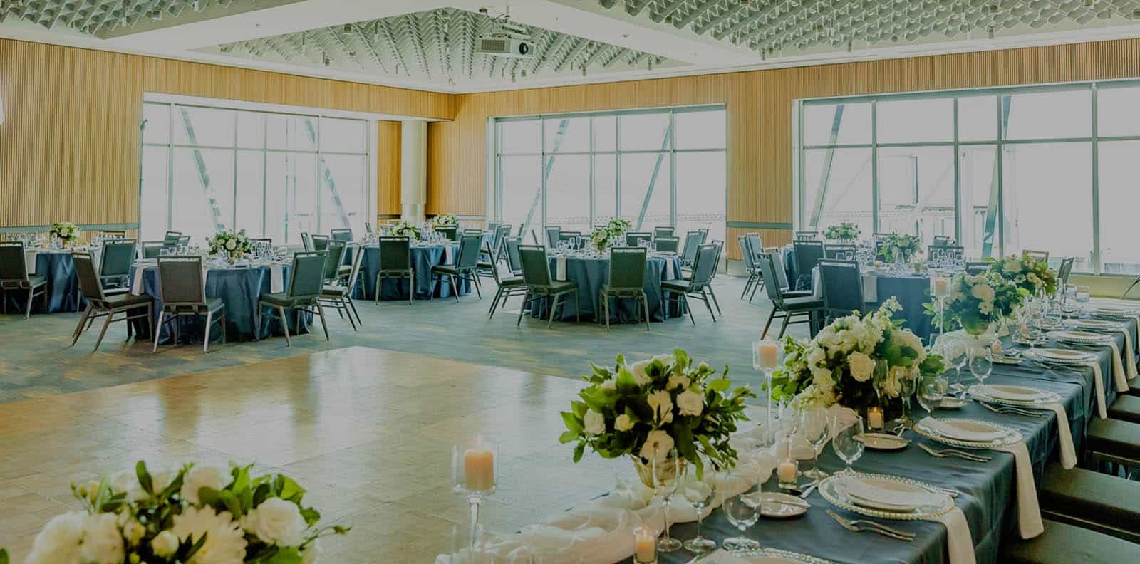 Bell Harbor event venue ballroom with harbor views and modern banquet seating