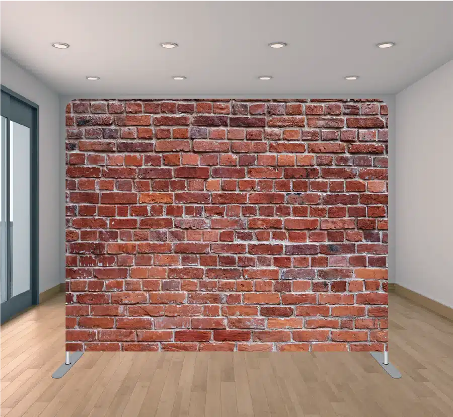 Red brick wall photo booth backdrop with weathered exposed-brick texture