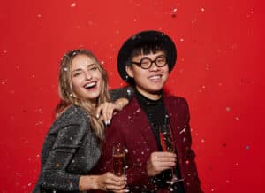 Contemporary Couple Posing on Red at Party